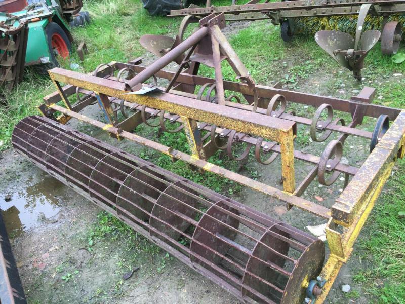 Spring tyne front mounted cultivator
